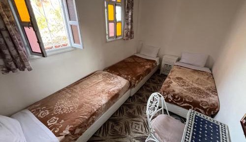 Basic Triple Room with Shared Bathroom