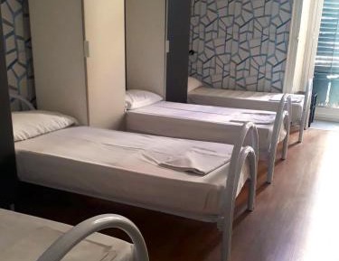 Single Bed in Dormitory Room