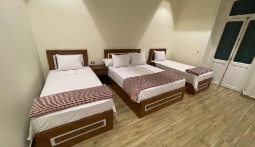 Quadruple Room with Private Bathroom