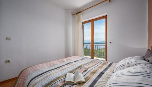 One-Bedroom Apartment with Balcony and Sea View