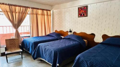 Quadruple Room with Private Bathroom
