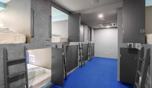 Single Bed in Dormitory Room