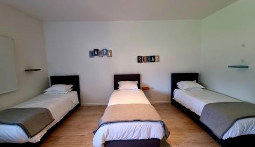 Single Bed in Dormitory Room