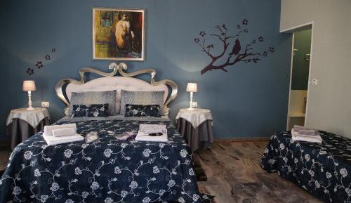 Quadruple Room with Private Bathroom