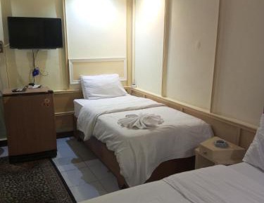 Quadruple Room with Private Bathroom