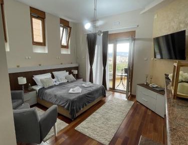 Deluxe Double Room with Balcony and Fireplace