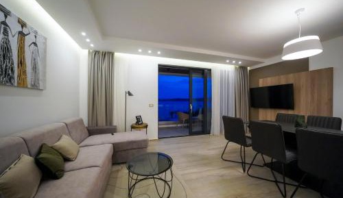 Two-Bedroom Apartment with Balcony and Partial Sea View - Ground Floor