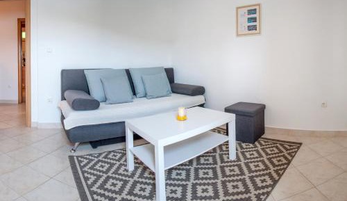 One-Bedroom Apartment with Balcony and Sea View