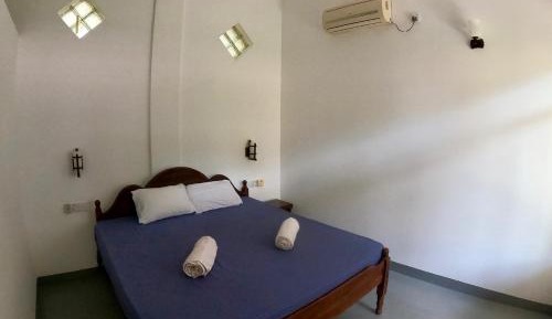 Deluxe Room (2 Adults + 1 Child)