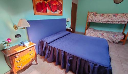 Quadruple Room with Private Bathroom