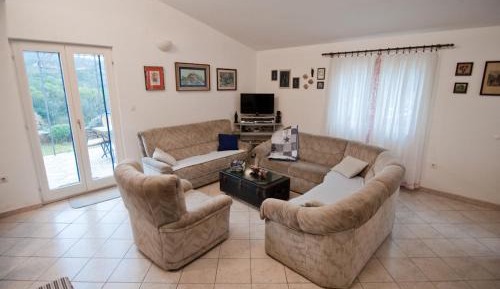 Three-Bedroom Apartment with Terrace and Sea View