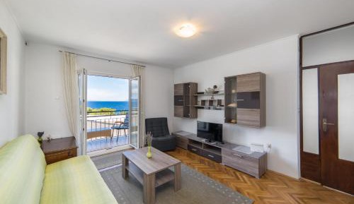 Three-Bedroom Apartment with Terrace and Sea View