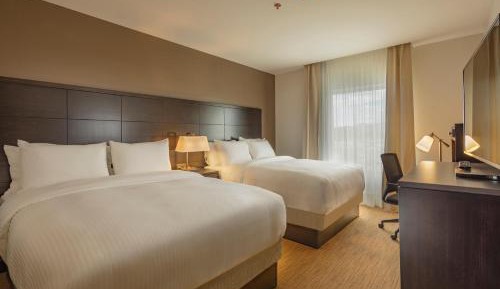 Two-Bedroom Suite with One Queen and Two Double Beds - Non-Smoking