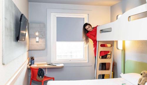 Room with One Queen Bed and One Bunk Bed