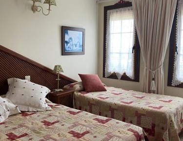 Quadruple Room with Private Bathroom