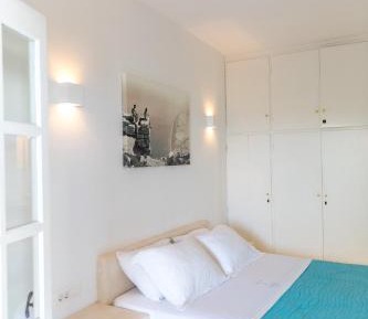 One-Bedroom Apartment with Garden & Village View