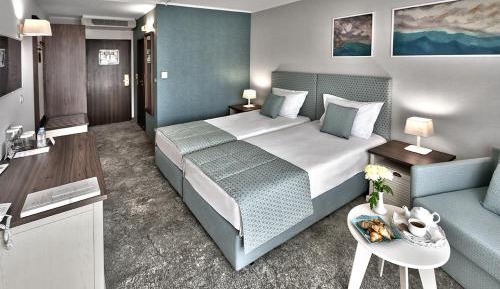 Double or Twin Room (2 Adults + 1 child up to 3.99 years old)