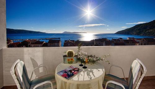 One-Bedroom Apartment with Balcony and Sea View