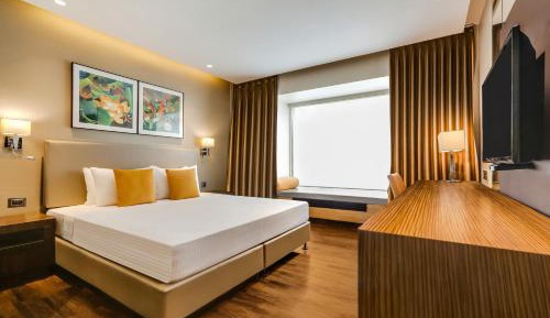 Business Room - Early Check in & Checkout upto 2 Hrs (Subject to availability)