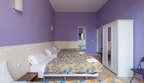 Quadruple Room with Shared Bathroom