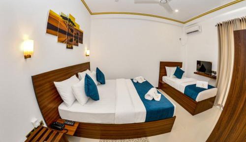 Deluxe Triple Room with Balcony