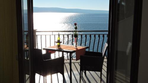 One-Bedroom Apartment with Balcony and Sea View