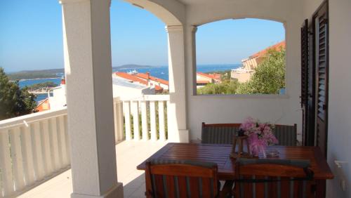 Two-Bedroom Apartment with Balcony and Sea View