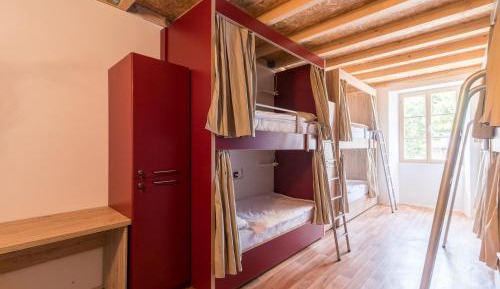 Bed in 8-Bed Female Dormitory Room