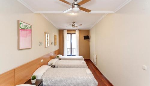 Quadruple Room with Shared Bathroom