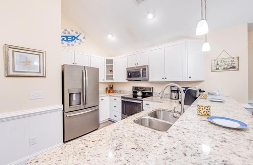 Hatteras Condo | On Special - Canal Front Penthouse Suite in Slash Creek with Resort Amenities an