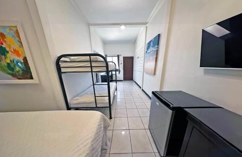 Tamarindo House | Family Suite #7 for 4 + Breakfast Included