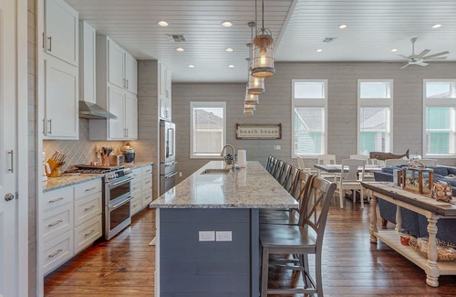 Port Aransas House | KD671 Luxurious Home with Private Heated Pool and Oasis, Partial Gulf Views and Golf Cart Included!