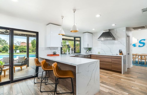 Continental Foothills House | Designer dream home with opulent backyard, private pool, hot tub, game room & AC
