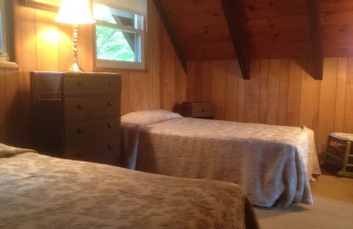 Conway Ski Chalet | Waterfront Chalet with private beach in the White Mountains of New Hampshire.