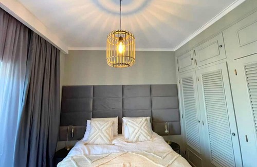 Costa de Caparica Apartment | Sunset View KING Bedroom
