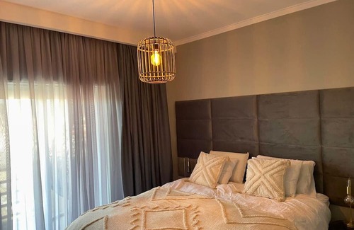 Costa de Caparica Apartment | Sunset View KING Bedroom