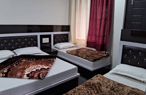 Kharsali Hotel | Goroomgo Uniyal Residency Uttarkashi