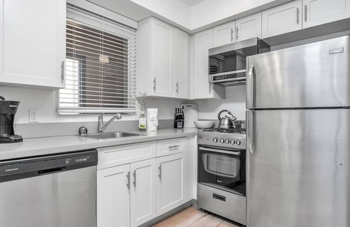Rampart Village Apartment | Chic Three Level 2-Bedroom 2-FULL Bathroom Loft with Balcony & 2-Parking space