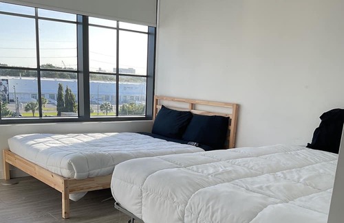 Wynwood Art District Condo | Luxury family sized condo.Restaurants and shopping right outside your door.