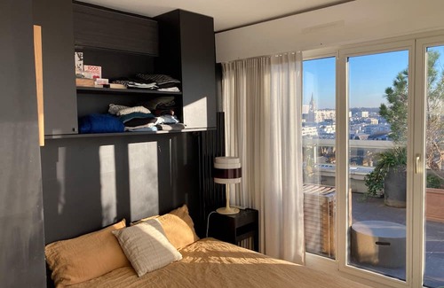 Combat Apartment | Rooftop, panoramic view of Paris.
