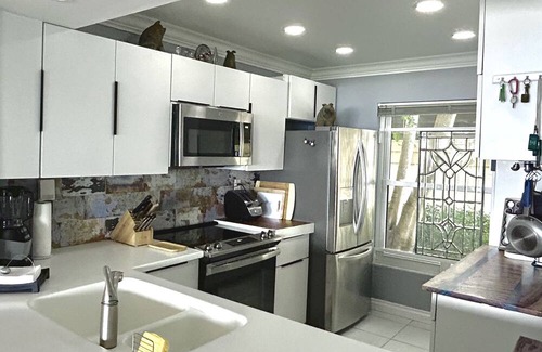 Casa del Mar Condo | Waterfront condo with bay view, pool, patio, & W/D - calendar month rental