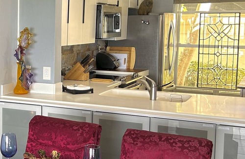 Casa del Mar Condo | Waterfront condo with bay view, pool, patio, & W/D - calendar month rental