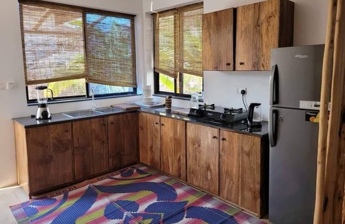 Bwejuu Beach Apartment | SAND BEACH PALM RESIDENCE