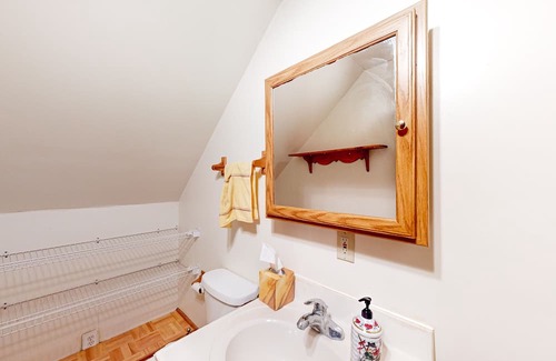 Cheboygan Cottage | Lakefront stay with two kayaks, jetted tub, wood stove, & W/D - dog-friendly