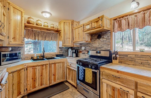 Prescott House | Peaceful home with scenic on-site pond, firepit, outdoor areas, & private W/D