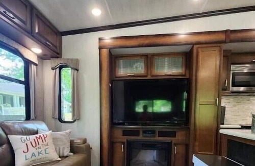 Reed Creek House | "Simply Unhitched" Lake Front RV with Swim Dock