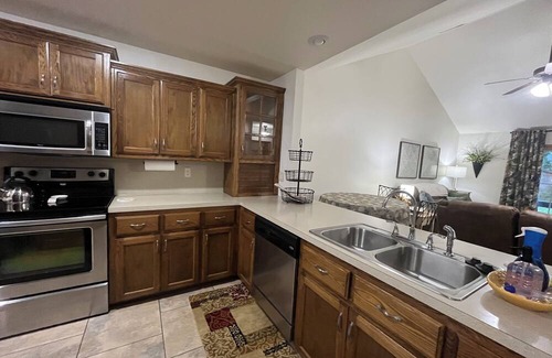 Spiro House | Upscale home with high end furnishings and memory foam king bed. 2 car garage