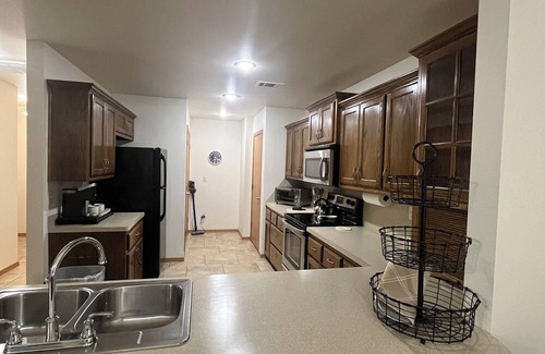 Spiro House | Upscale home with high end furnishings and memory foam king bed. 2 car garage