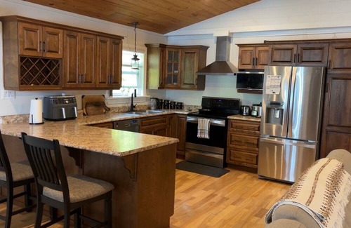 Goobies House | Welcome to Sunset Cove, Cozy home, enjoy the landscaped property & outdoor area.