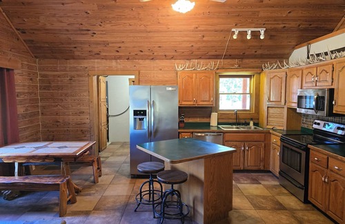 Stockton Cabin | Secluded Cabin - Hunt + Fish + Float Sac River/Stockton. Family and Pet Friendly